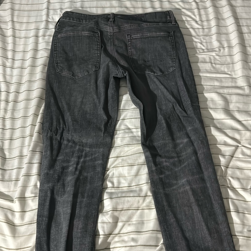 American eagle Flex    size 31x32. Color- Dark Grey athletic cut